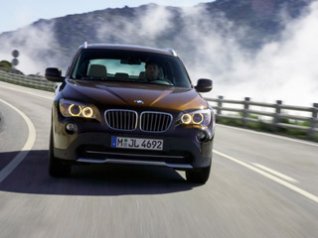 BMW X1 Front Speed Brown wallpapers